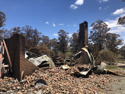 The remains of a house destroyed by a bushfire