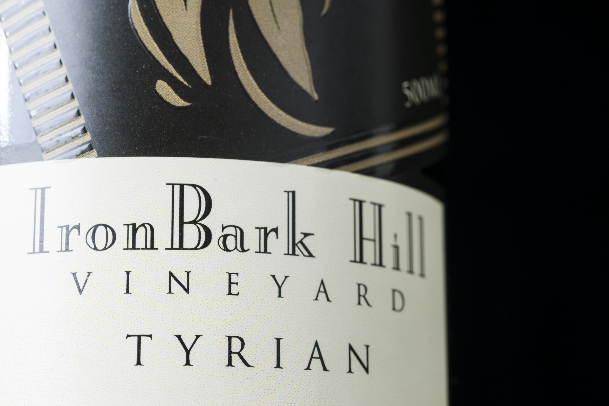 close shot of label on wine bottle - text reads: Ironbark Hill Vineyard, Tyrian