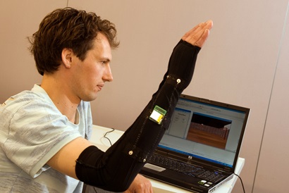 Dr Richard Helmer demonstrates the wearable body mapping sleeve