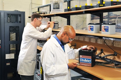 Photo of researchers in an energy laboratory working with Ultrabatteries