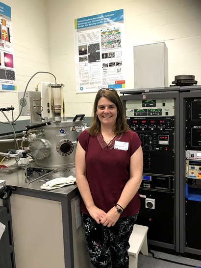 Teacher Sandra Woodward, standing in science laboratory with equipment