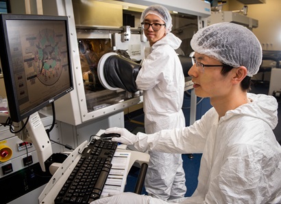 Researchers a work in the NexGen Solar Fabrication Laboratory