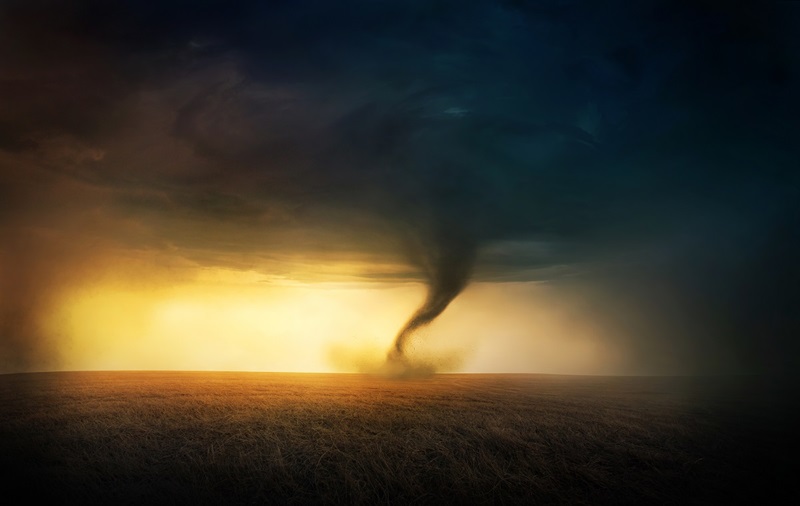 Tornado funnel in landscape