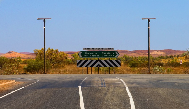 Sign post at T-intersection in outback Western Australia