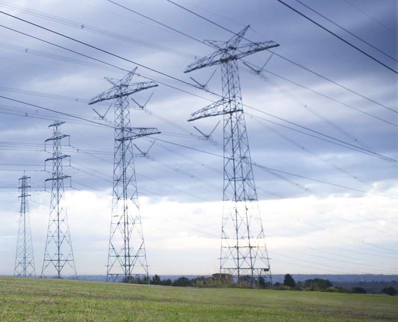 Powerlines against a cloudy sky