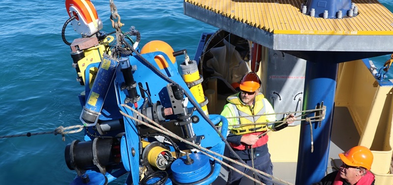 Men deploying monitoring equipment