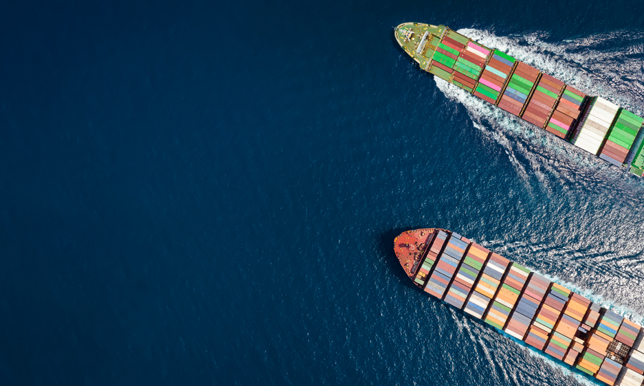 Aerial view of two cargo ships at sea