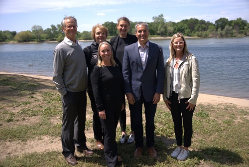 Australian and Californian scientists meet with Secretary Crowfoot by the Sacramento River. 