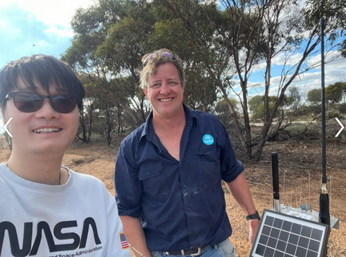 Brendan Malone (CSIRO) and Yi Yu (ANU) installing new soil moisture monitoring instrumentation.