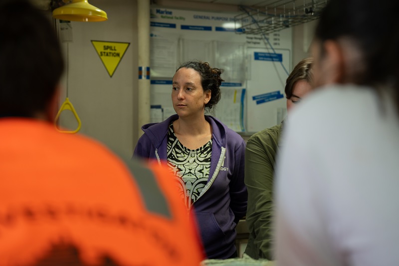 A person standing in a laboratory.