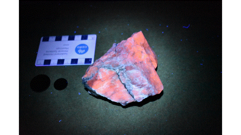 Spodumene sample under ultraviolet light.