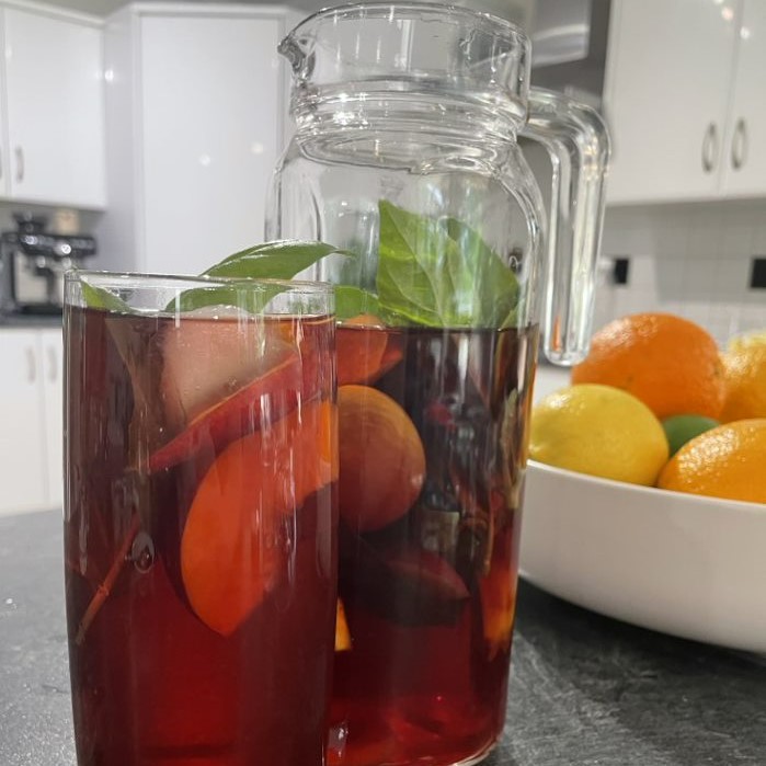 Peach and ginger iced tea with basil.