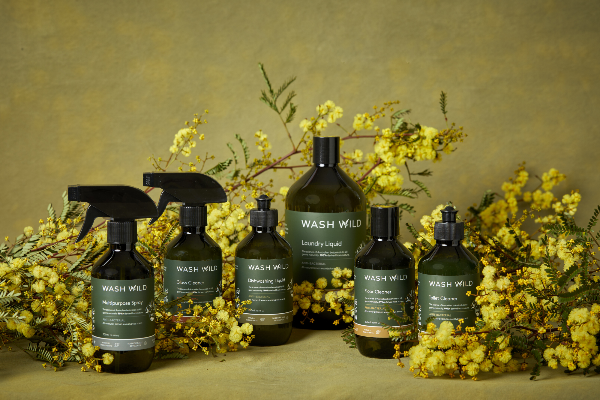 Set amongst native Australian plants, this image displays the entire Wash Wild product range